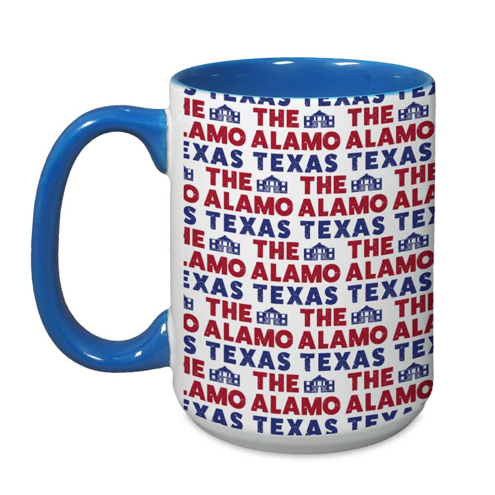 The Alamo Flag Mug features a blue handle and rim, decorated with “The Alamo Texas” in red and blue plus small blue Alamo illustrations—perfect as a Texas souvenir or gift.