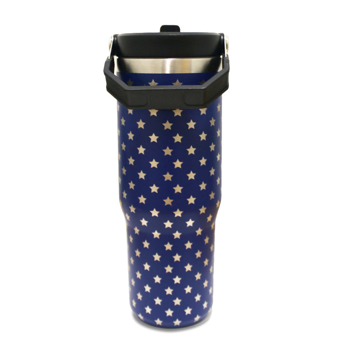 Celebrate America’s 250th with the America’s 250th Flip Top Tumbler—a tall, blue tumbler adorned with white stars, featuring a top black handle and stainless steel rim.