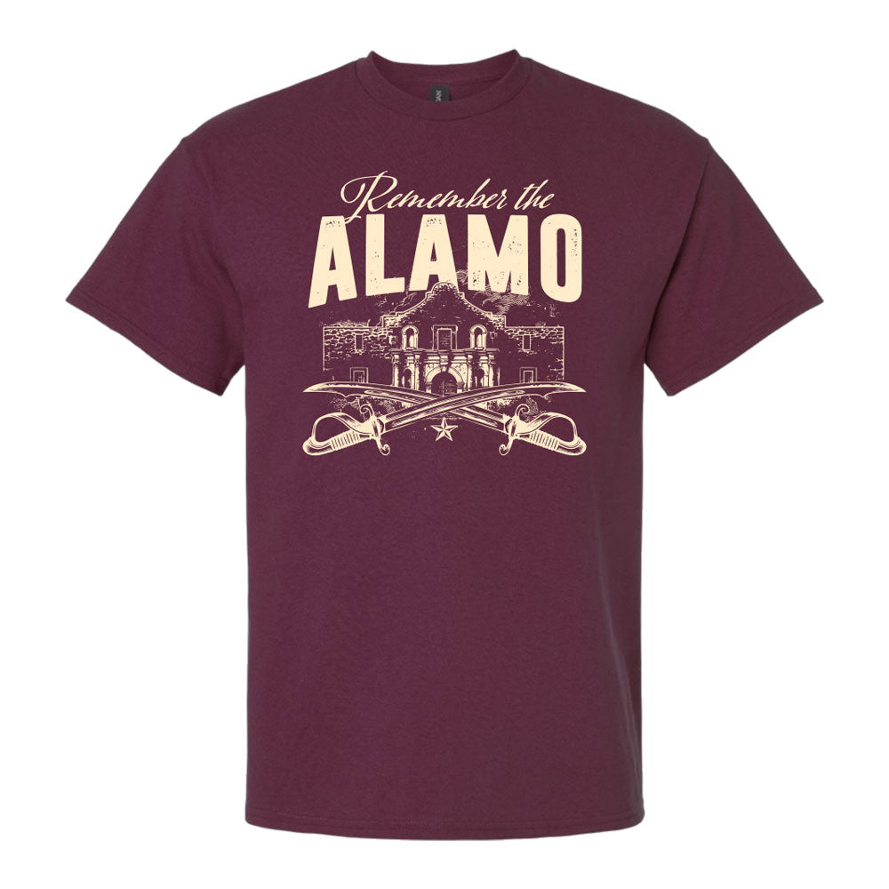 Maroon Remember the Alamo T-Shirt featuring a cream-colored graphic of the mission, two crossed swords, and the historical text.