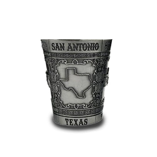The Alamo Metal Shot Glass is a decorative silver shot glass with ornate patterns, "San Antonio" at the top, "Texas" at the bottom, and a state outline—an ideal souvenir from Texas or keepsake from Alamo City.