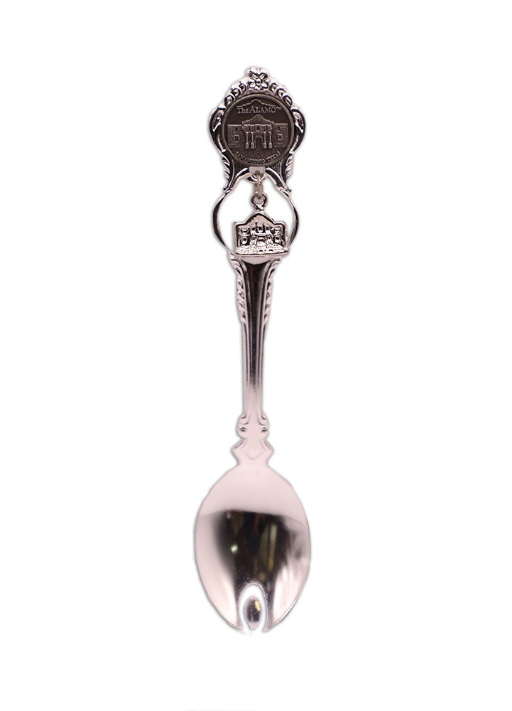 The Alamo Charm Spoon is a silver-plated souvenir with ornate handle designs, featuring a relief of the Alamo and "San Antonio" at the top—an ideal keepsake or Texas independence gift.