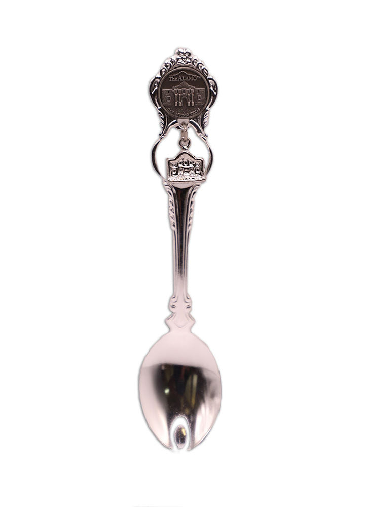 The Alamo Charm Spoon is a silver-plated souvenir with ornate handle designs, featuring a relief of the Alamo and "San Antonio" at the top—an ideal keepsake or Texas independence gift.