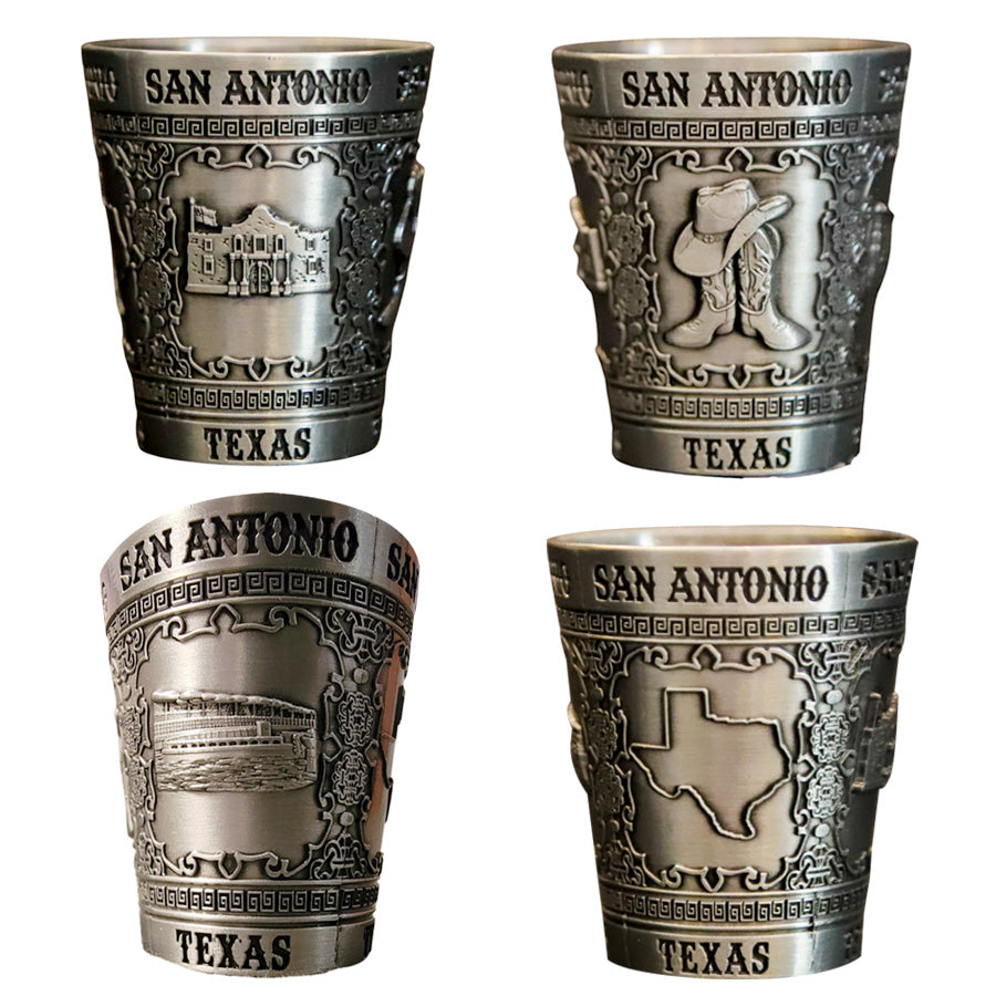 The Alamo Shot Glass set includes four metal Texas souvenirs from San Antonio, each with a unique design: a historic building, dancing figure, riverboat, and ornate Texas outline—perfect keepsakes for any collection.